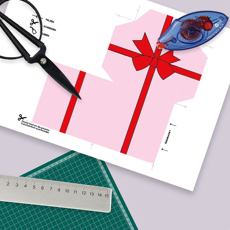 DIY Gutscheinbox mit Schleifen-Design als PDF Vorlage – Schneiden, falzen und kleben für eine selbstgemachte Geschenkbox.