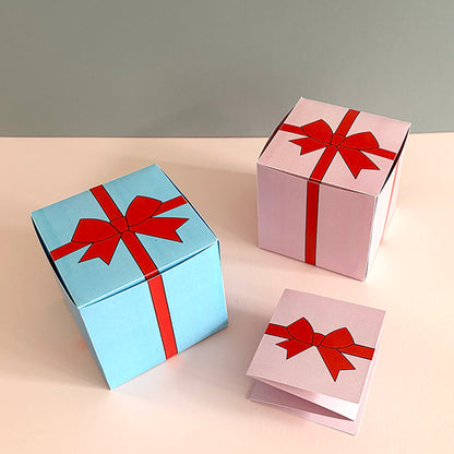 Geschenkbox mit Schleife in Rosa und Blau inklusive Klappkarte – flexible Verpackung für Wertgutscheine